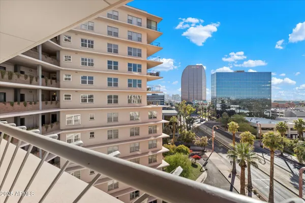 a view of a building from a balcony