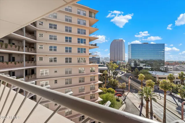a view of a building from a balcony