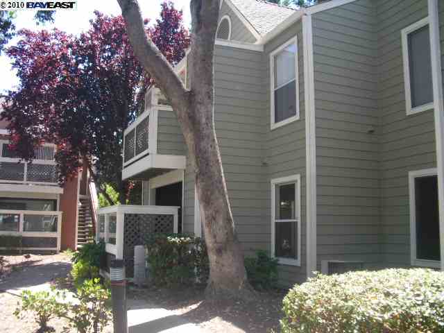 285 Reflections Drive, Unit 15 San Ramon, CA 94583 - Photo 1 of 1 a front view of a house with garden
