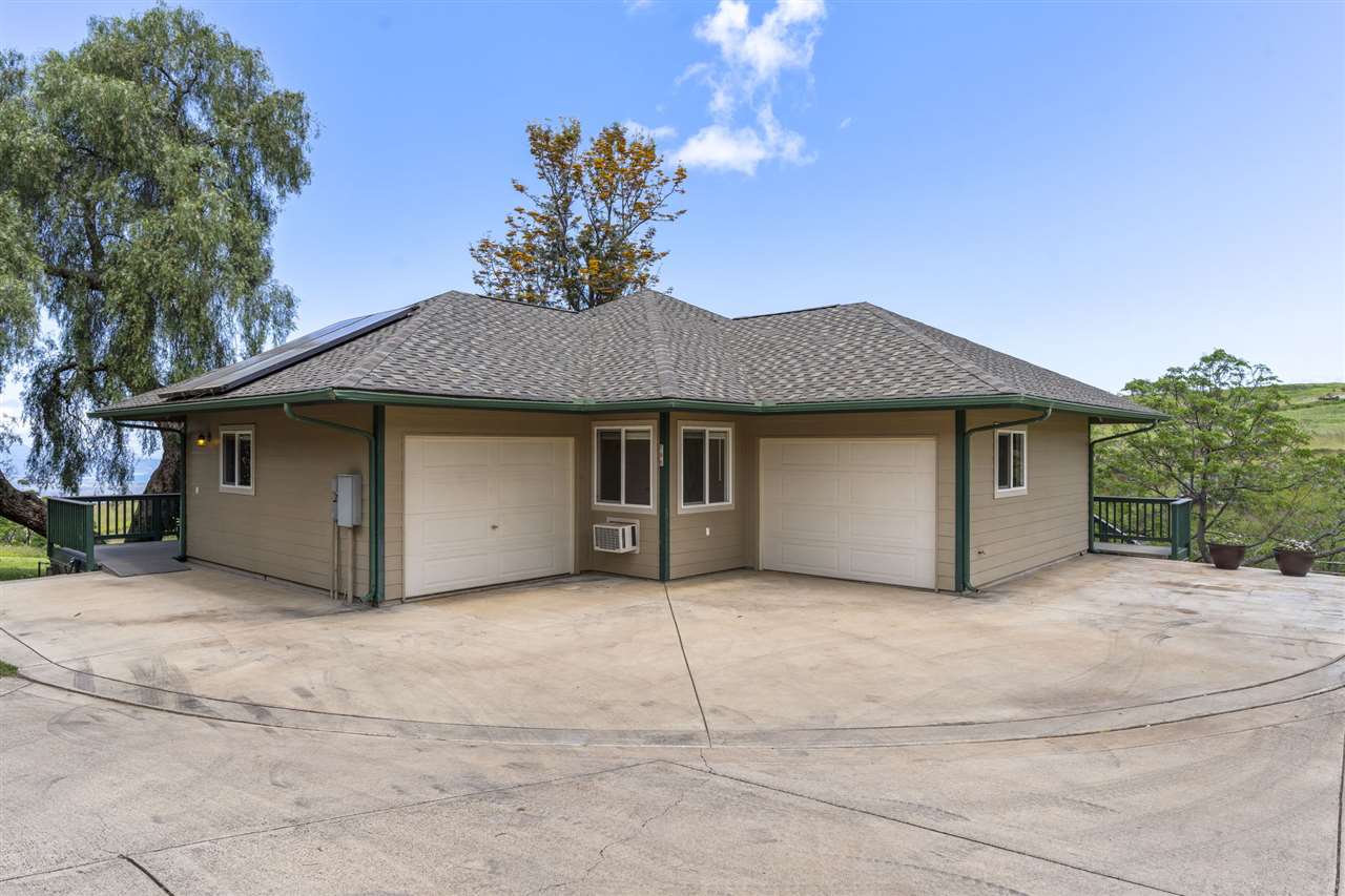 790 Holopuni Road, Unit B Kula, HI 96790 - Photo 22 of 29 a view of a house with a garage