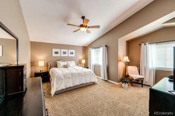 2016 West Ashwood Place Highlands Ranch, CO 80129 - Photo 26 of 40 a bedroom with bed and window