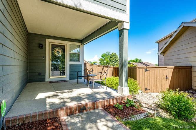 2016 West Ashwood Place Highlands Ranch, CO 80129 - Photo 3 of 40 a view of backyard with garden