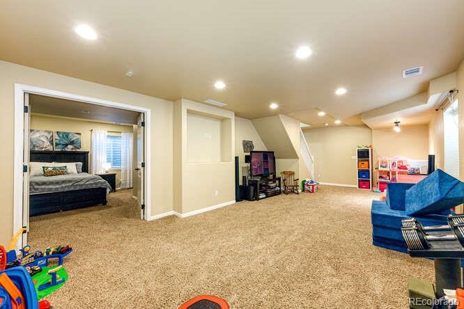 2016 West Ashwood Place Highlands Ranch, CO 80129 - Photo 34 of 40 a view of a room with gym equipment