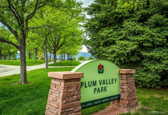2016 West Ashwood Place Highlands Ranch, CO 80129 - Photo 38 of 40 a sign on the side of the green field