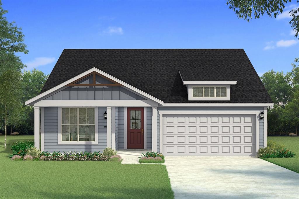 front view of a house with a yard