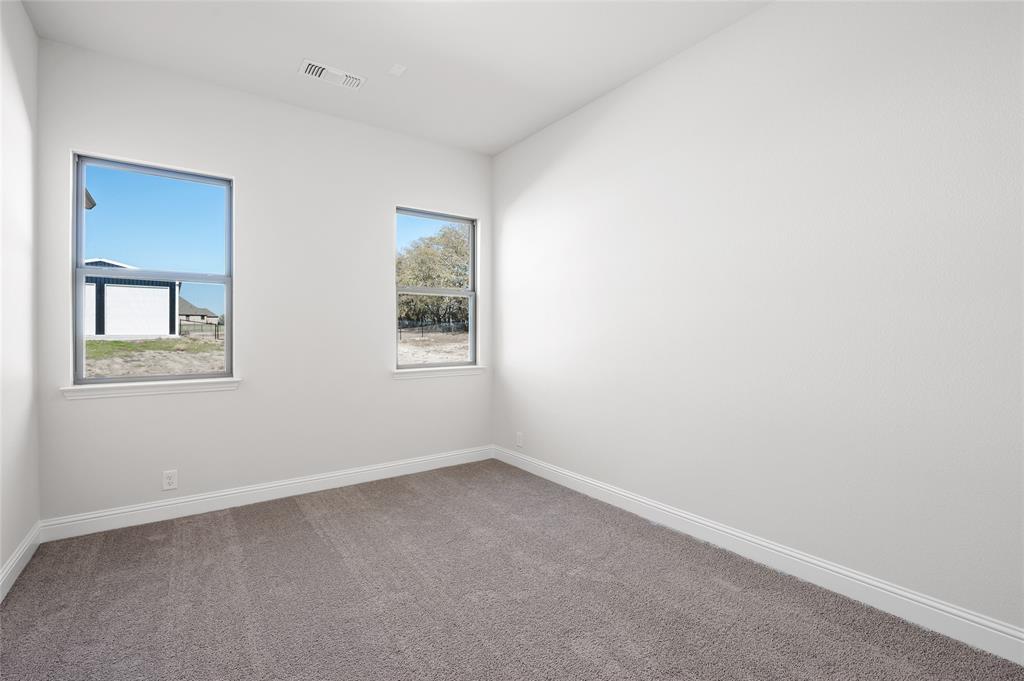 3 Beech Street Van Alstyne, TX 75495 - Photo 12 of 35 an empty room with a window