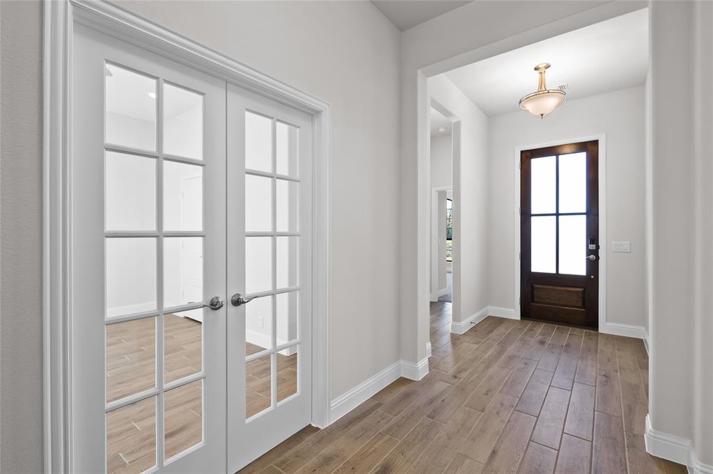 3 Beech Street Van Alstyne, TX 75495 - Photo 15 of 35 wooden floor in an empty room with a window
