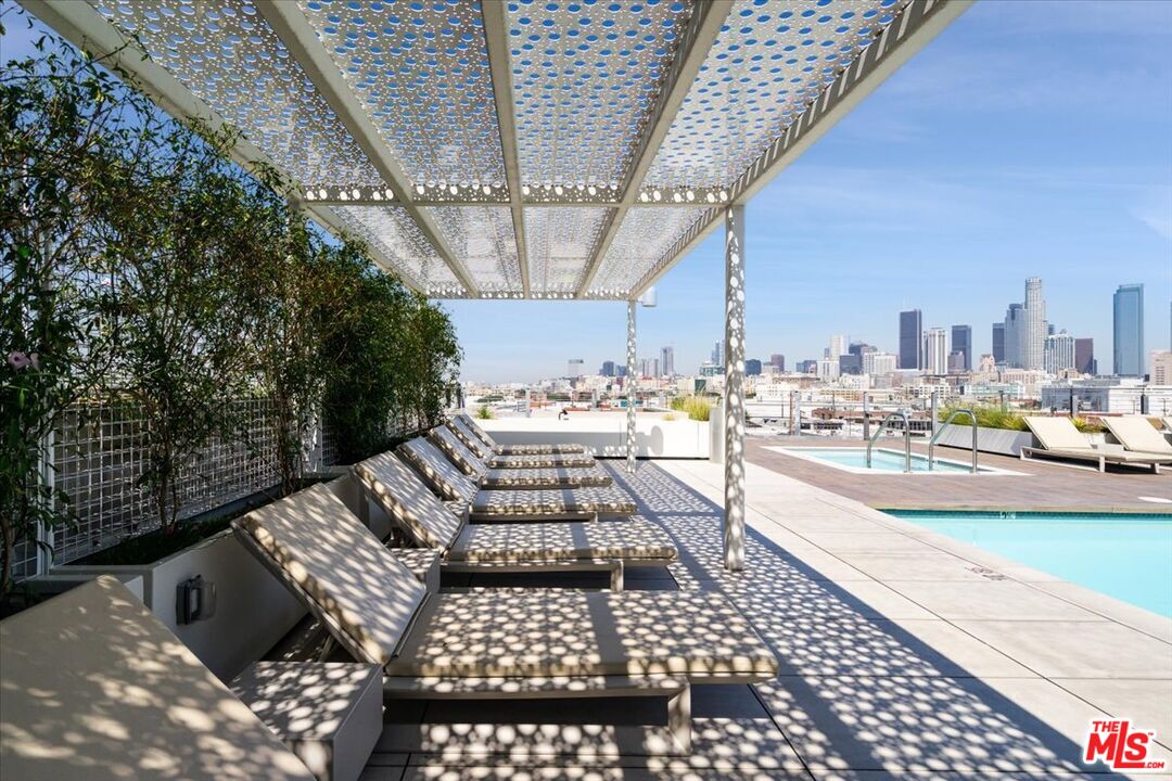 510 South Hewitt Street, Unit 106 Los Angeles, CA 90013 - Photo 22 of 26 a outdoor space with lots of white furniture
