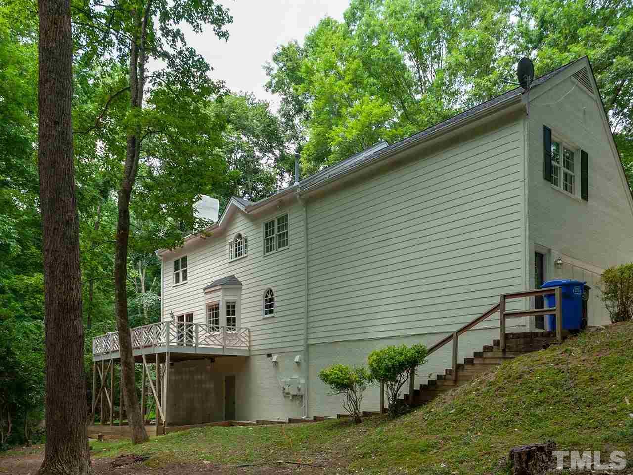 701 Presnell Court Raleigh, NC 27615 - Photo 23 of 24 a view of a house with a backyard