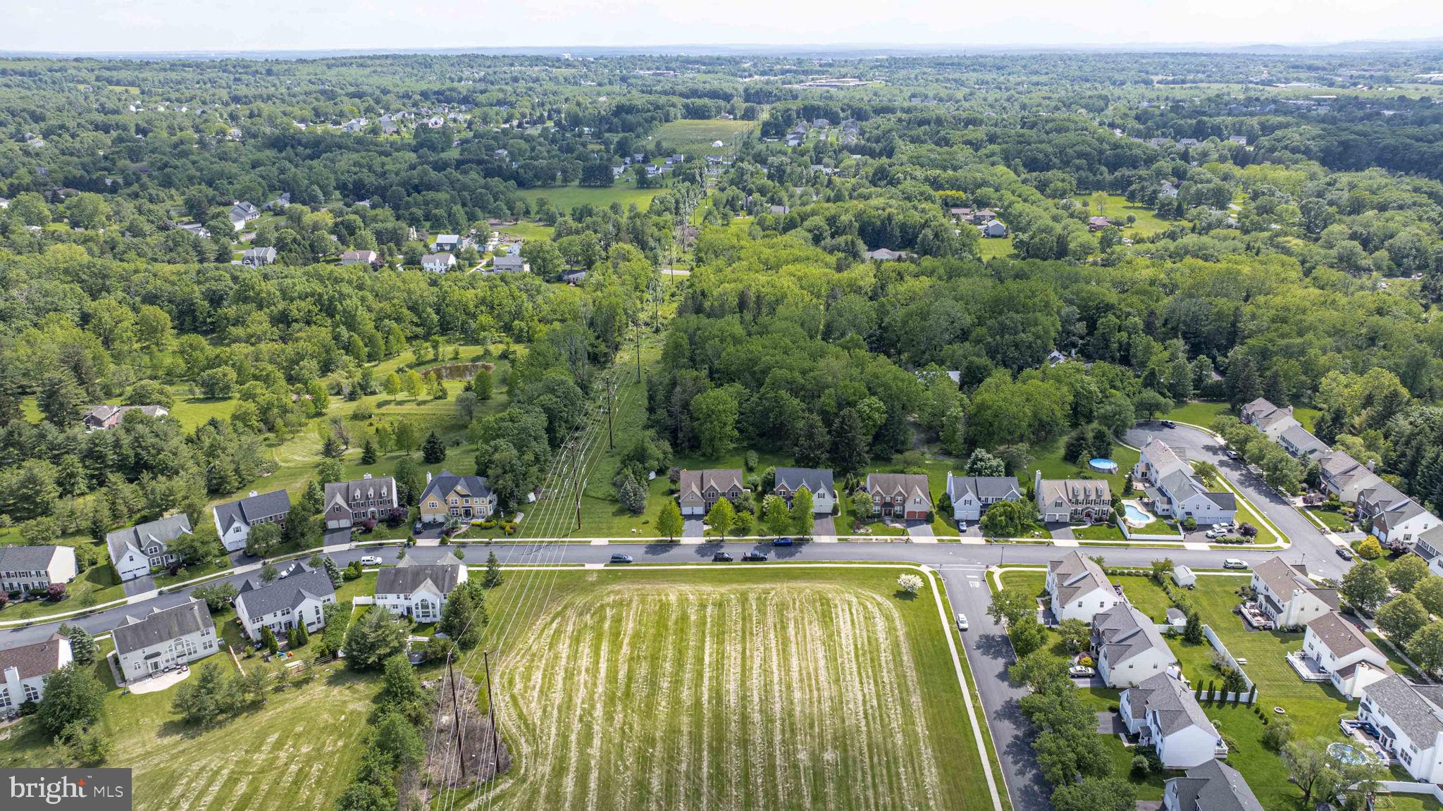 408 Longleaf Drive Perkasie, PA 18944 - Photo 32 of 36 a view of a swimming pool and mountains