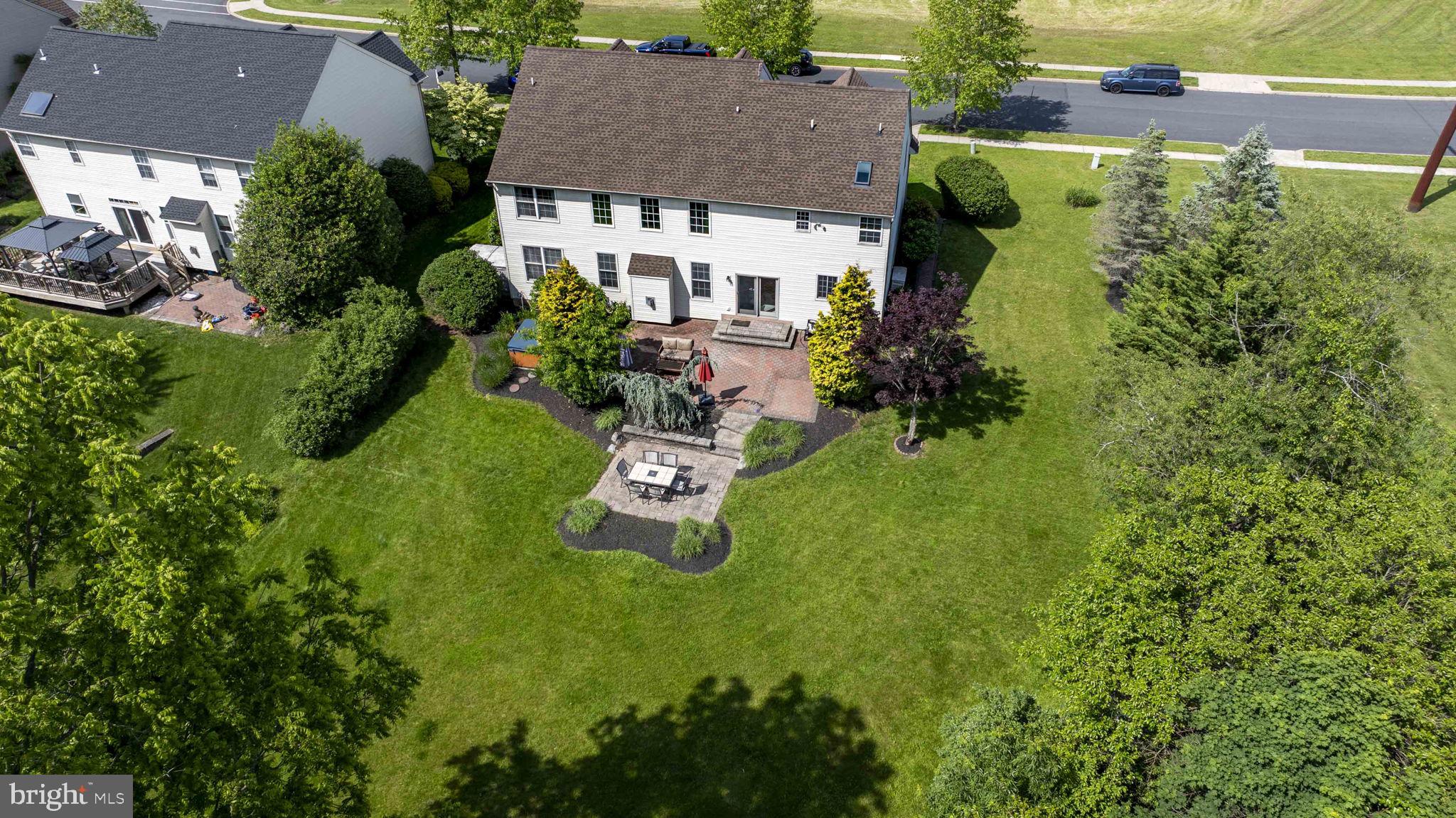 408 Longleaf Drive Perkasie, PA 18944 - Photo 34 of 36 an aerial view of a house with yard swimming pool and outdoor seating
