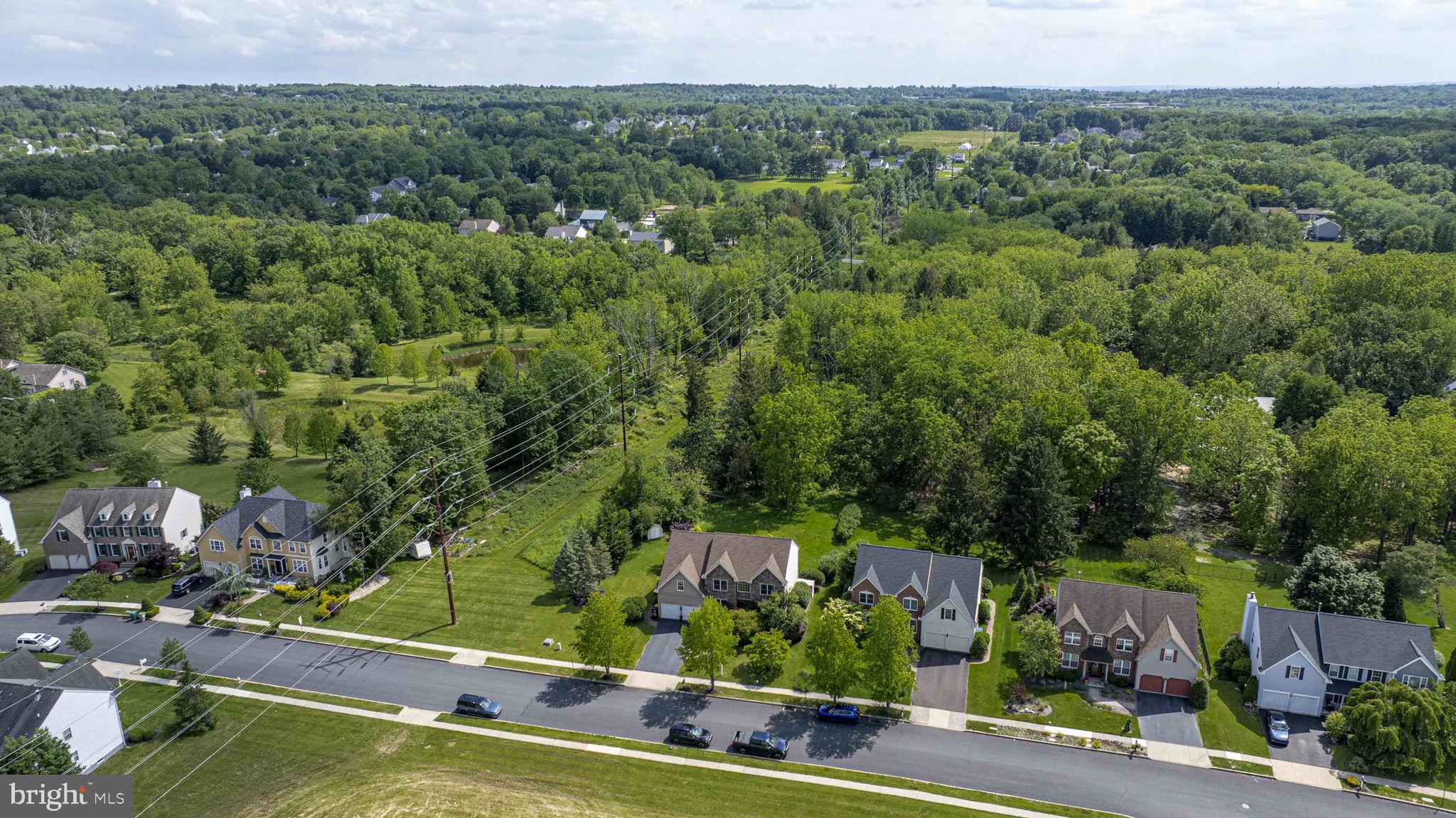 408 Longleaf Drive Perkasie, PA 18944 - Photo 35 of 36 an aerial view of residential houses with outdoor space and trees