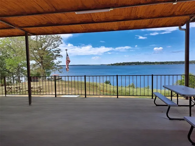 a view of swimming pool with seating space
