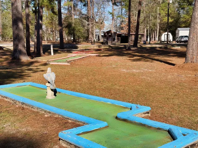 a swimming pool with outdoor seating