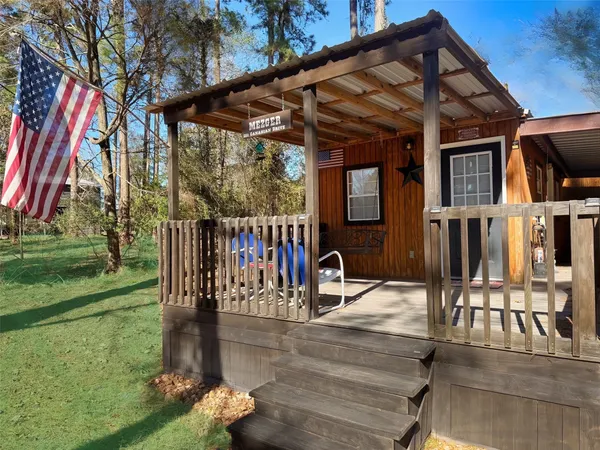 a patio with wooden fence