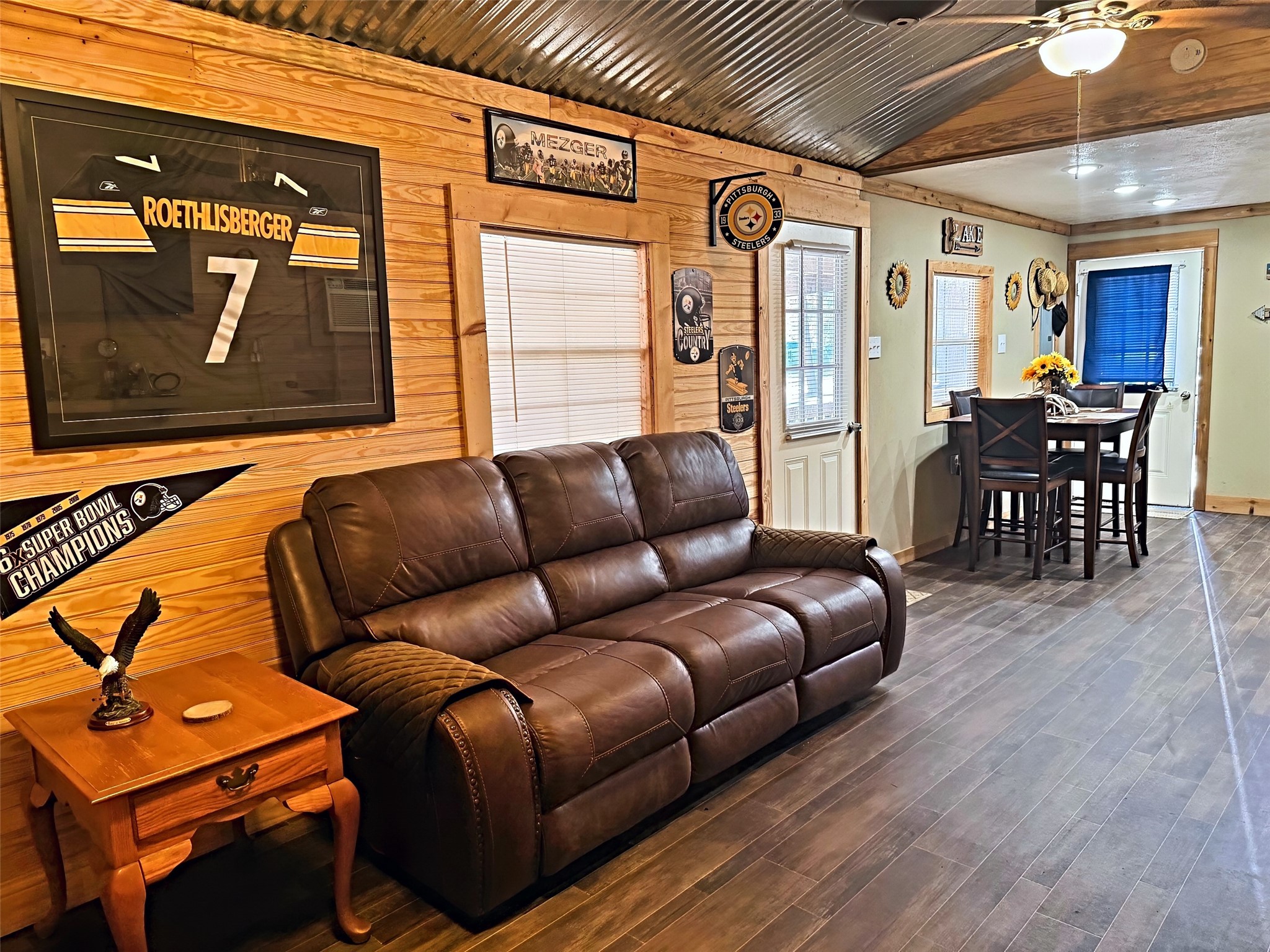 151 Canadian Drive Trinity, TX 75862 - Photo 5 of 19 a living room with furniture a ceiling fan and a wooden floor
