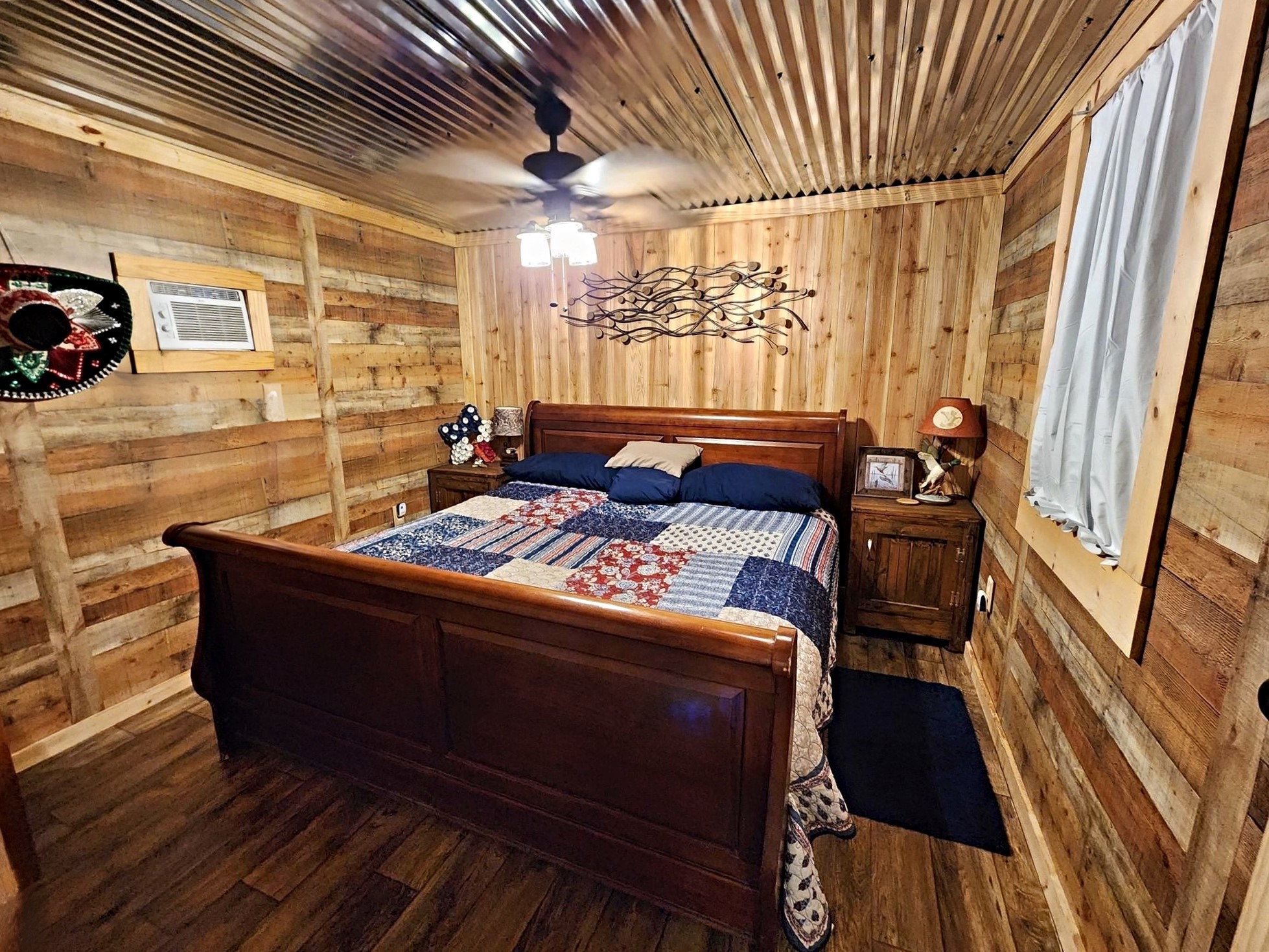 151 Canadian Drive Trinity, TX 75862 - Photo 8 of 19 a living room with a couch wooden floor and a table