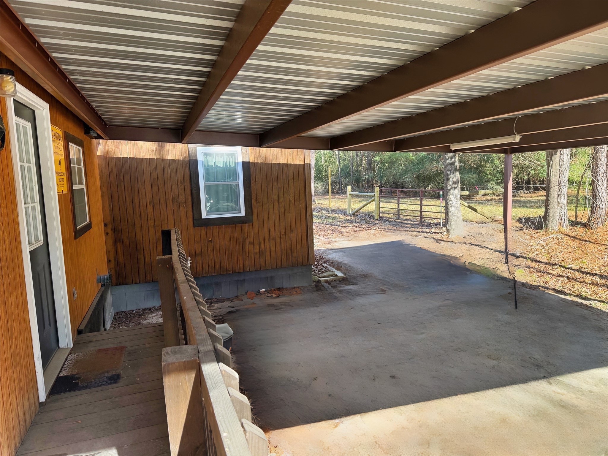 151 Canadian Drive Trinity, TX 75862 - Photo 10 of 19 a view of a room with wooden floor and windows