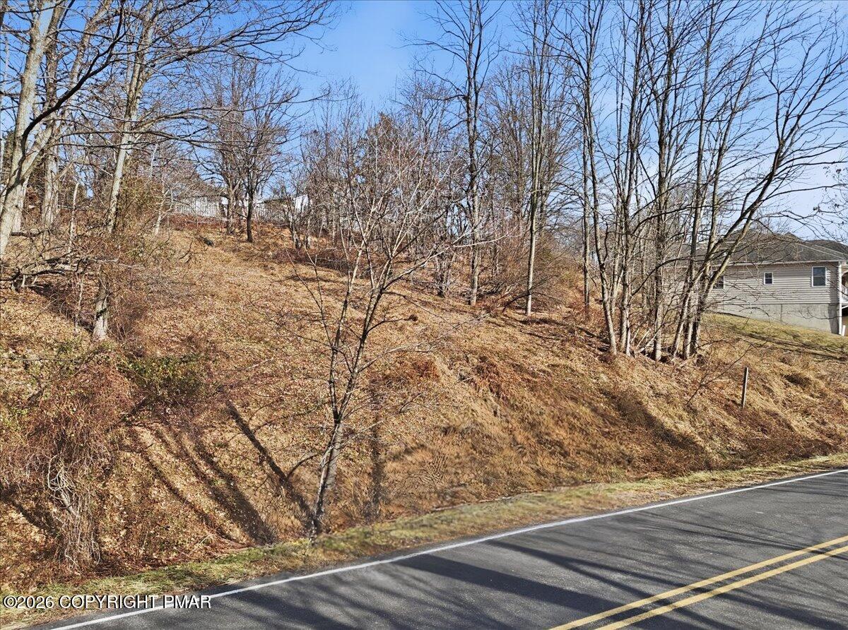 516 Edgemont Road Stroudsburg, PA 18360 - Photo 2 of 16 a view of a yard from a balcony