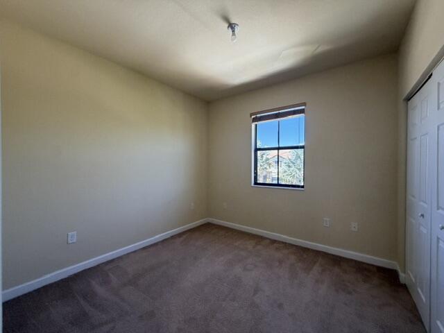 23765 Southwest 118 Avenue, Unit 23765 Homestead, FL 33032 - Photo 19 of 36 an empty room with a window
