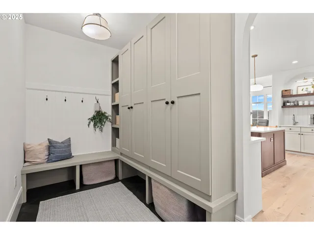 a view of kitchen with furniture and wooden floor