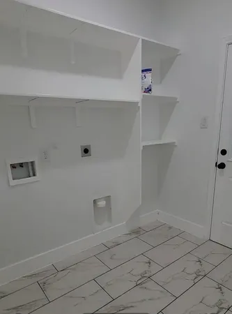 a view of kitchen and windows