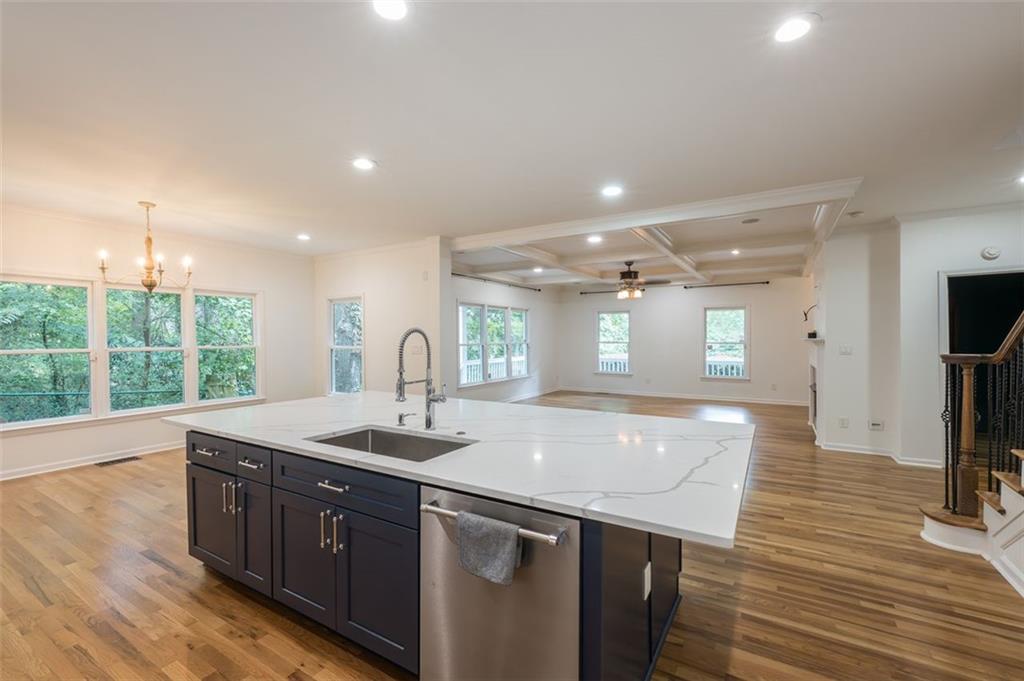 1018 Berne Street Southeast Atlanta, GA 30316 - Photo 15 of 34 a kitchen with a sink and wooden floor