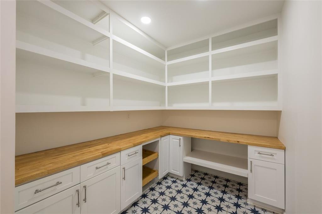 1018 Berne Street Southeast Atlanta, GA 30316 - Photo 16 of 34 a storage room with wooden floor