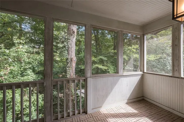 a view of a room with windows