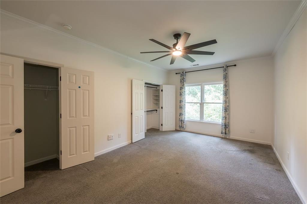 1018 Berne Street Southeast Atlanta, GA 30316 - Photo 28 of 34 a view of empty room with a ceiling fan and window