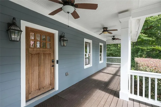 a view of porch with wooden floor and windows