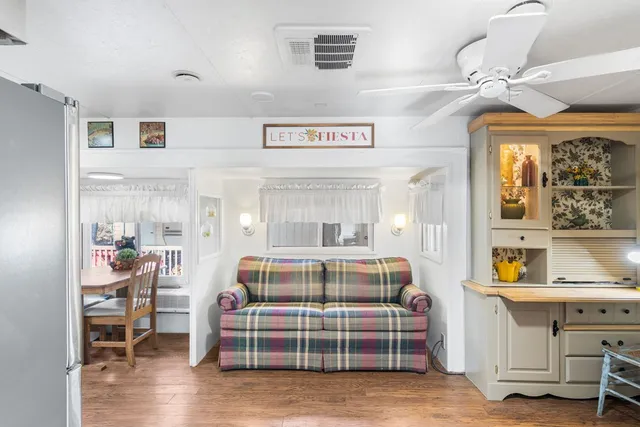 a view of dining room with furniture and window