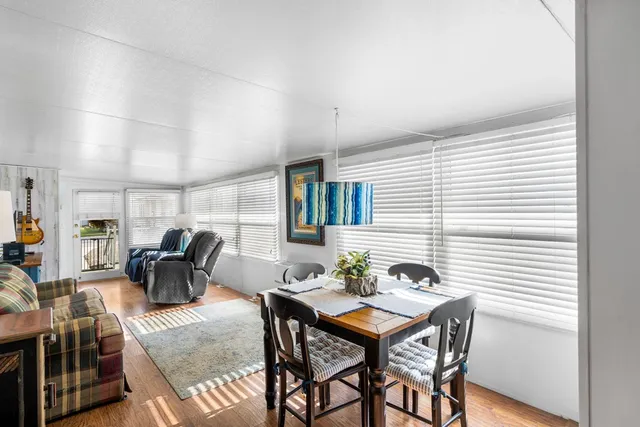 a view of a dining room with furniture