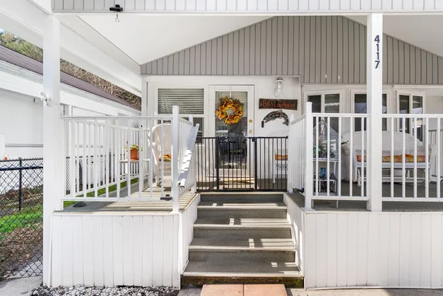 a front view of a house with a porch