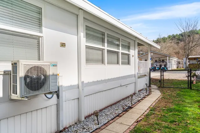 a view of a house with a street