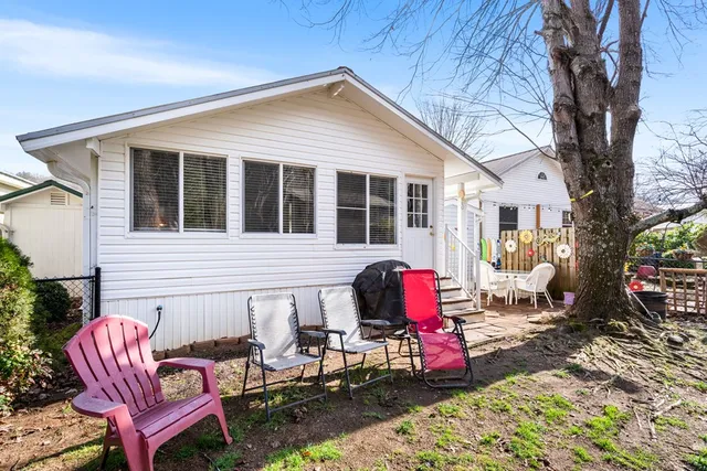 a view of a chairs and tables in patio
