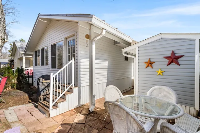 a house with trees in the background