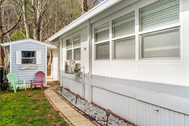 a front view of a house with swimming pool