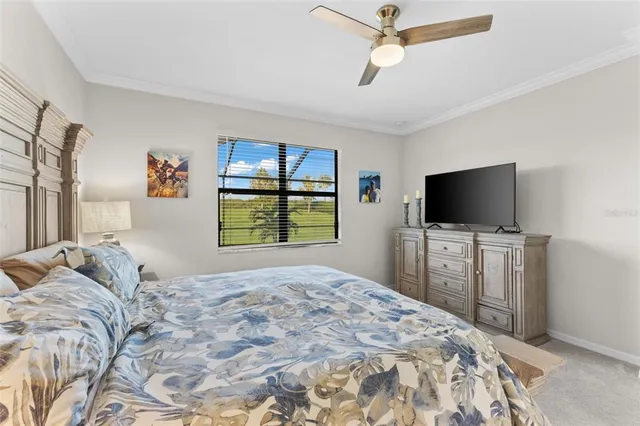 a bathroom with a granite countertop double vanity sink mirror and shower