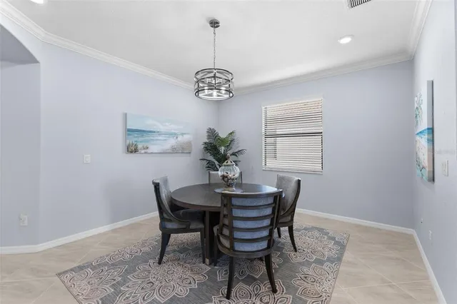 a view of a dining room with furniture