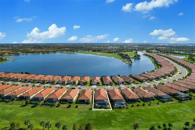 a view of a lake with a building in the background