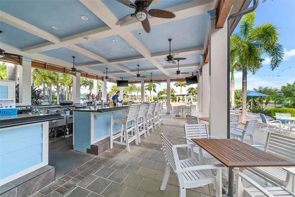 a front view of house with yard outdoor seating and barbeque oven
