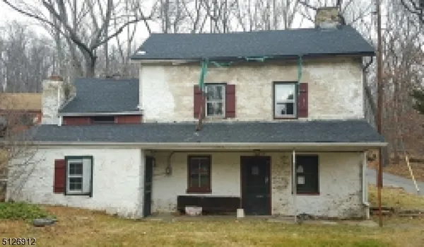 a front view of a house with yard