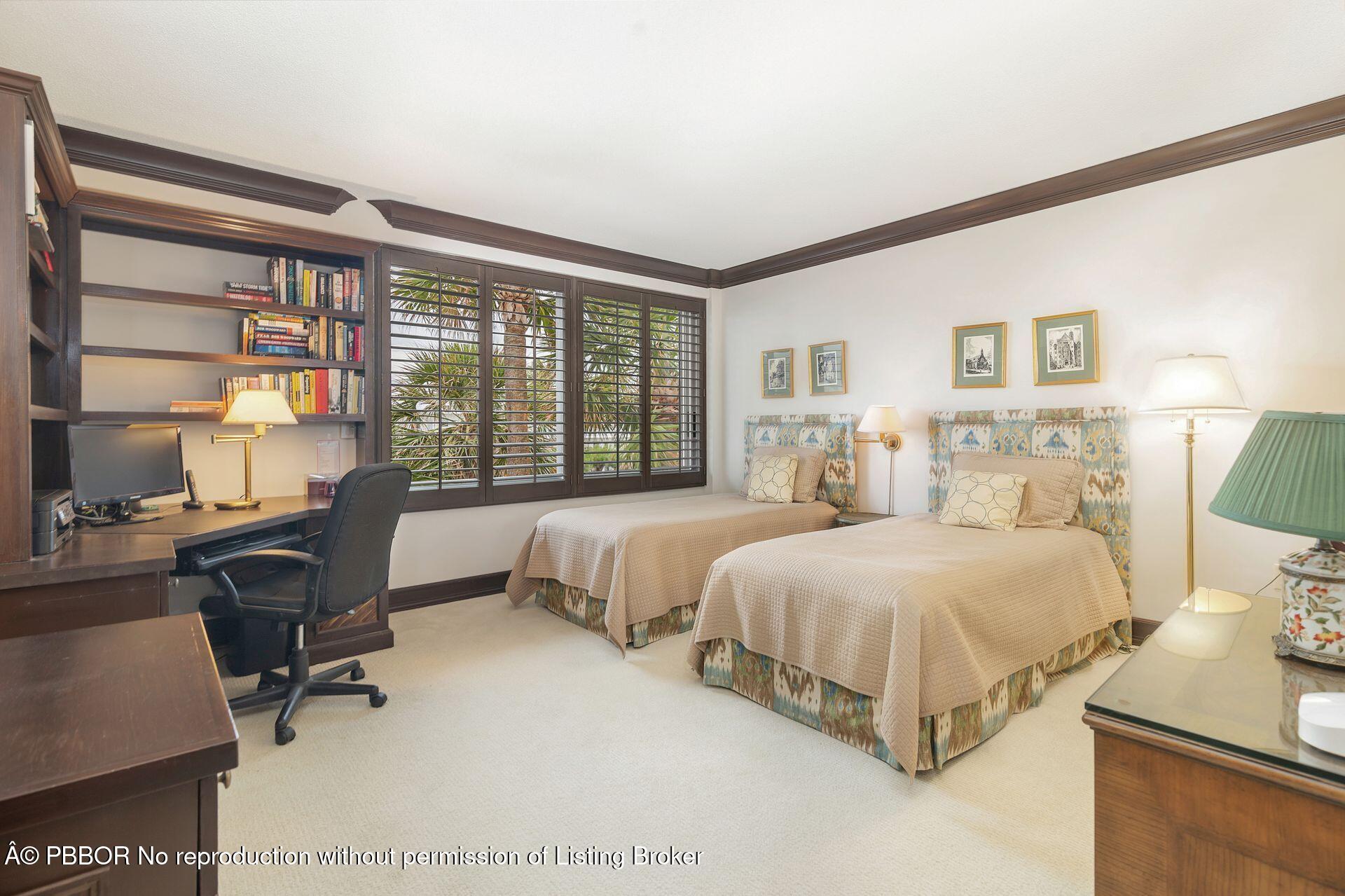 170 North Ocean Boulevard, Unit 409 Palm Beach, FL 33480 - Photo 13 of 34 a bedroom with a bed and a large window