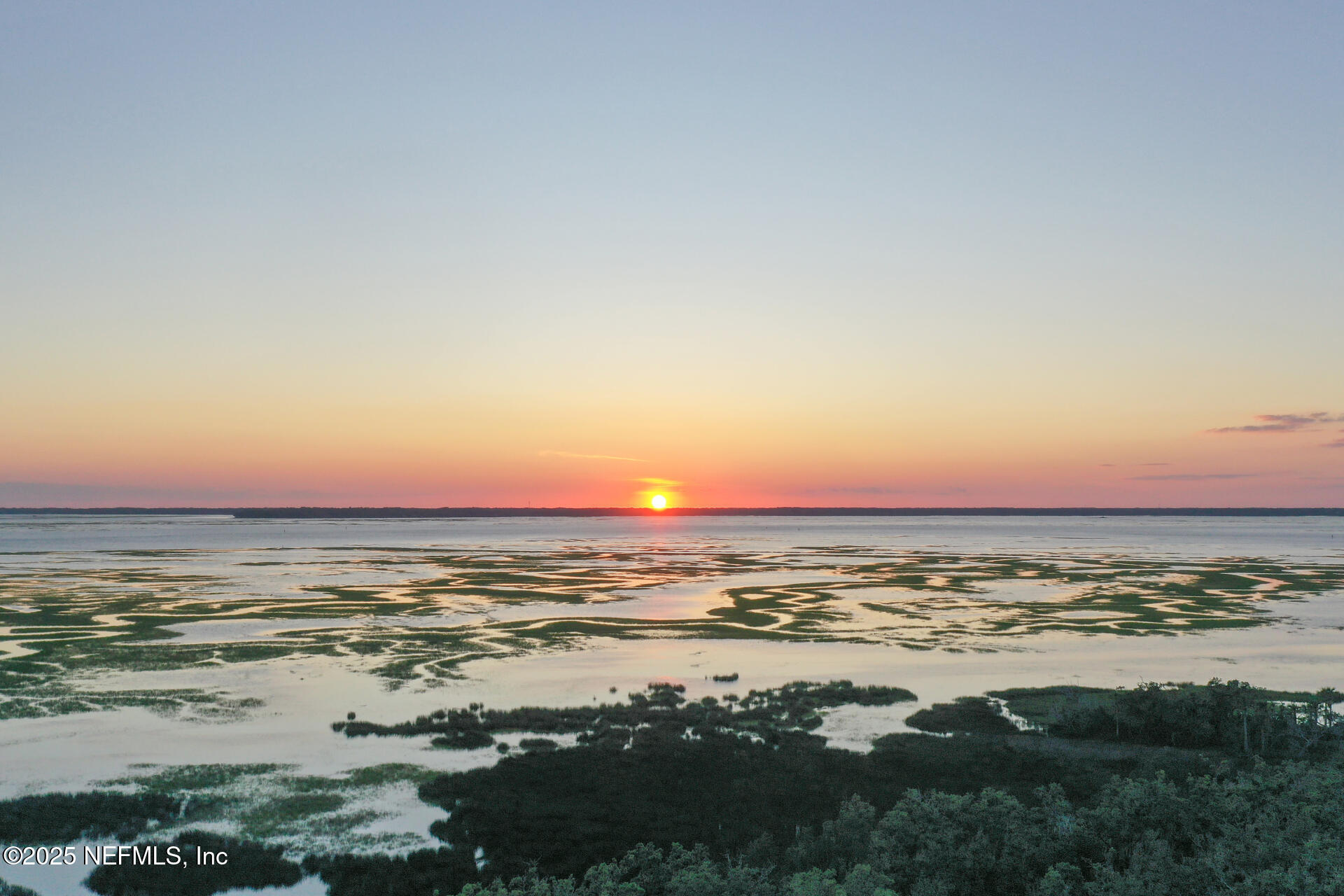 3426 Sea Marsh Road Fernandina Beach, FL 32034 - Photo 2 of 39 a view of an ocean and beach