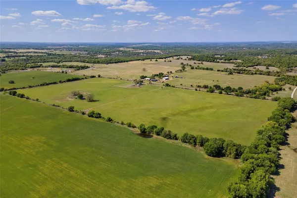 a view of an ocean and city
