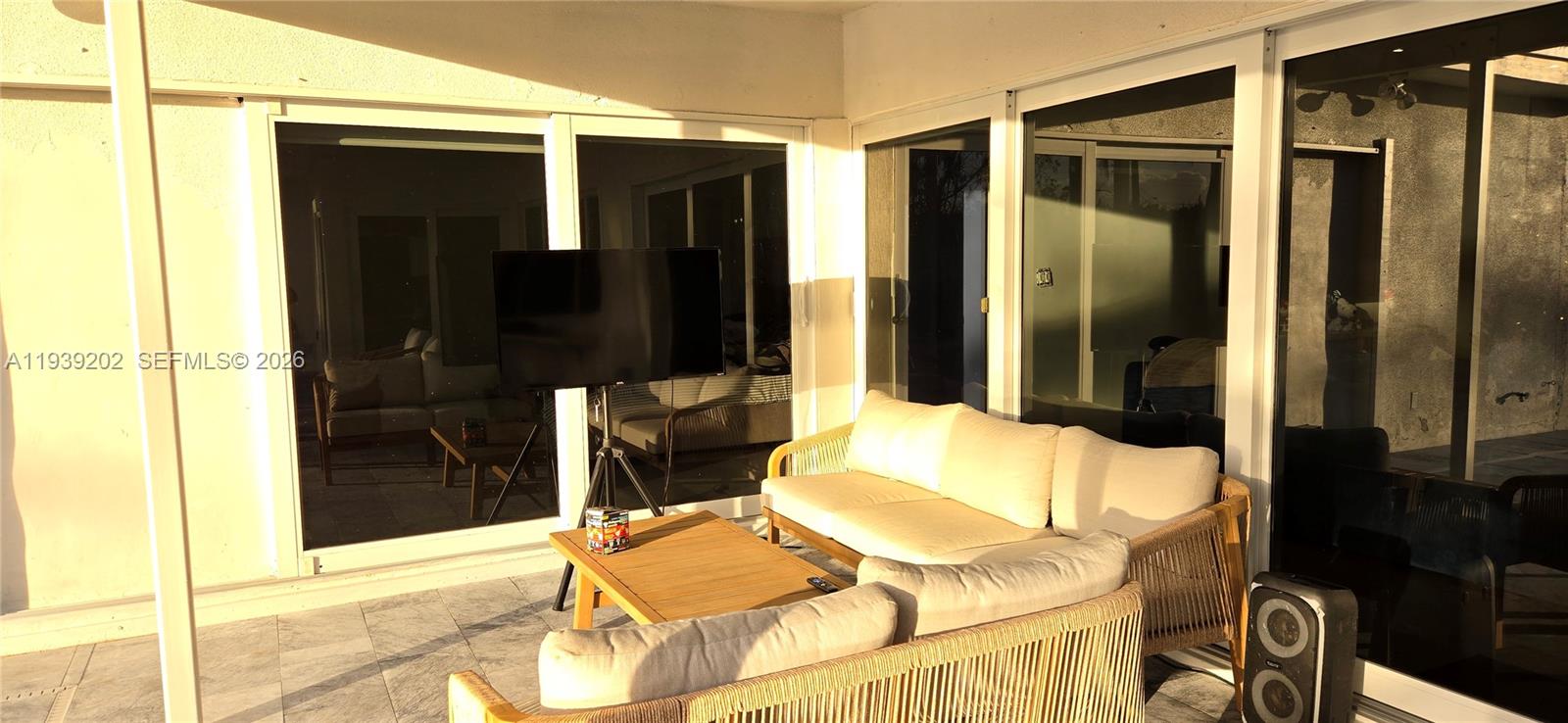 4012 East Shore Road Miramar, FL 33023 - Photo 15 of 22 a bedroom with a bed and walk in closet