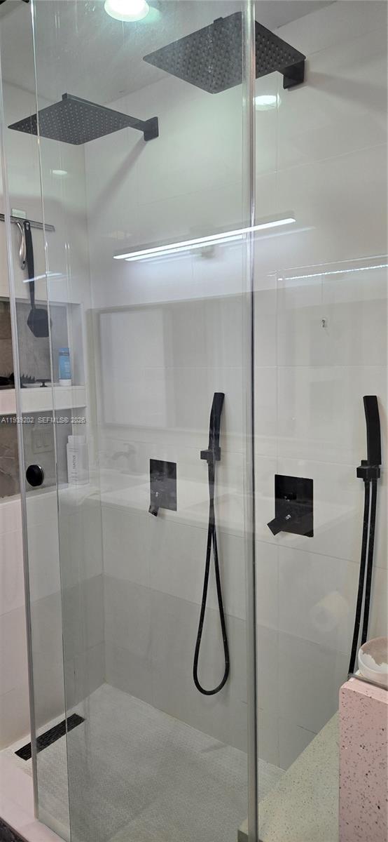 4012 East Shore Road Miramar, FL 33023 - Photo 17 of 22 a bathroom with a shower