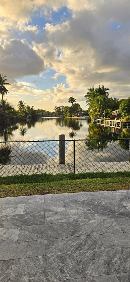 4012 East Shore Road Miramar, FL 33023 - Photo 10 of 22 a view of a lake with a big yard
