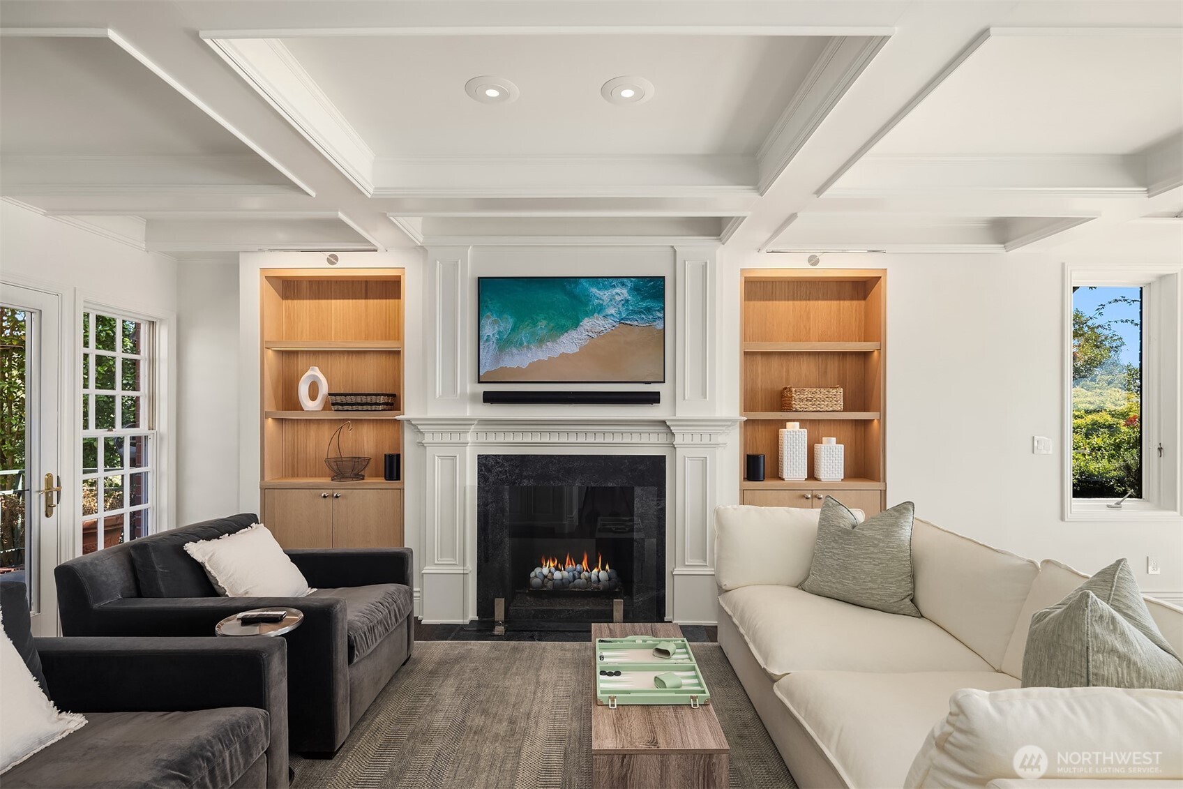 2307 Evergreen Point Road Medina, WA 98039 - Photo 15 of 40 a living room with furniture a window and a fireplace